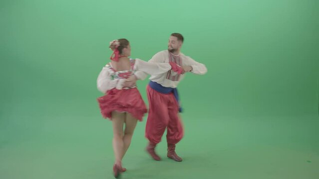 Folk dance Polka in Ukraine national dacing couple isolated on Green Screen - 4K Video Footage