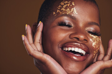 Gold, laughing and woman face closeup with makeup and luxury treatment with rich spa mask. Glitter,...