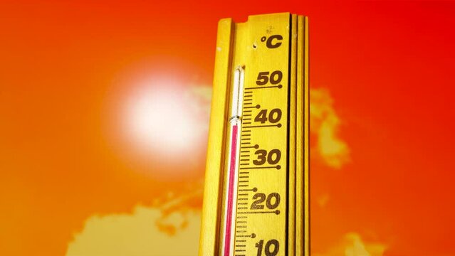 Hot summer, the thermometer displays a high heatwave temperature of 38 - 47 degrees Celsius. Extreme weather conditions caused by global climate change on Earth.
