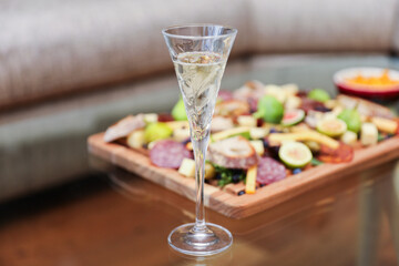 champagne and cup glass embodies celebration, luxury, and toasts, symbolizing joyous moments and achievements in elegant social gatherings