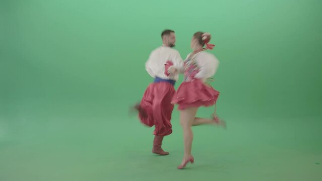 Ukraine national dancing couple shows folk dance - 4K Video Footage