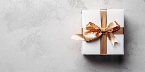 White Gift Box with Gold Ribbon on White Background. Christmas Present