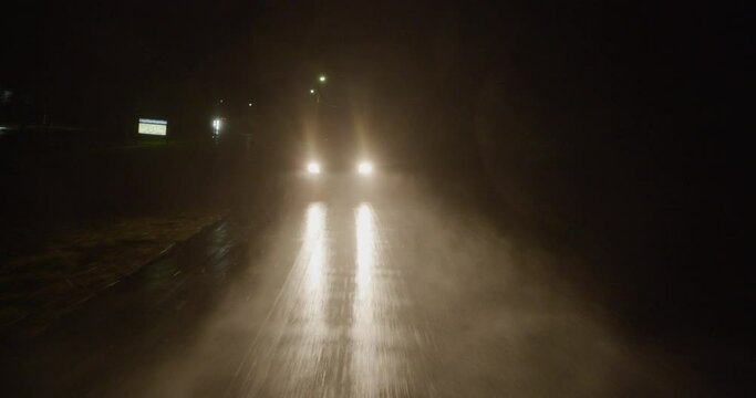 Cars driving in the rain at night 15