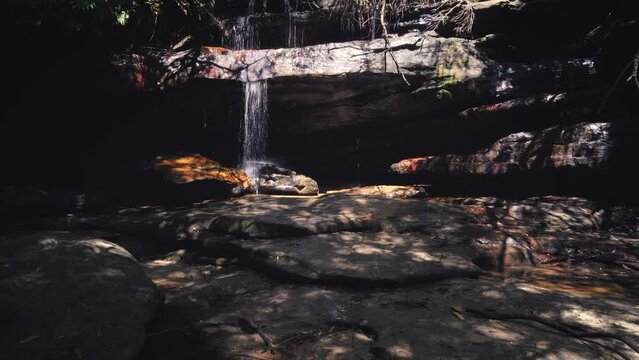 4k Video - A small waterfall along Floods Creek at Somersby Falls in Brisbane Waters National Park in NSW, Australia.