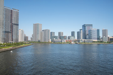 Fototapeta na wymiar Cityscape with Skyscrapers and Lake in Tokyo Japan