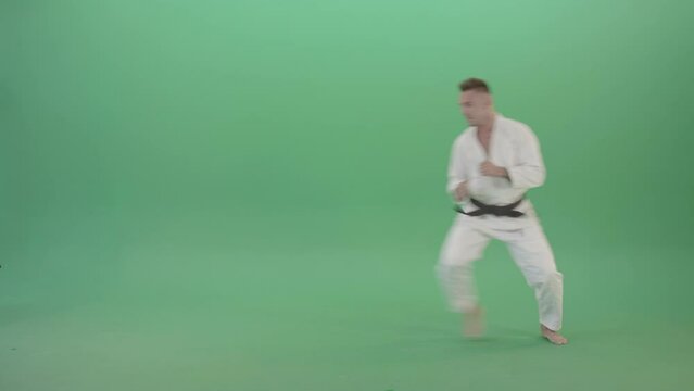 Mortal Kombat by Karate Ju Jitsu trainer sportsman isolated on green screen 4K Video 