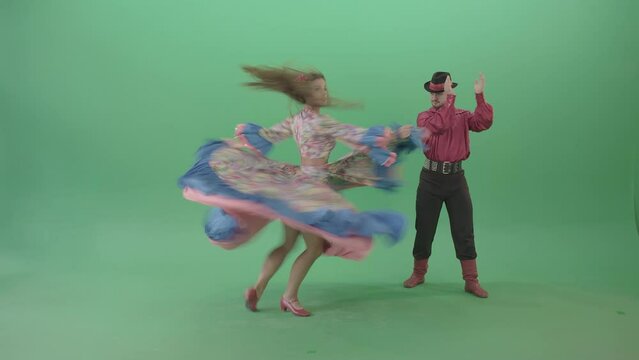  Balkan couple dance hot folk dance in gipsy costumes in green screen studio 4K Video Footage