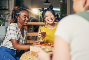 Friends, conversation and women with food in home for relaxing, bonding and lunch together. Friendship, happy and group of people with drinks laughing for relationship, visit and chat in living room