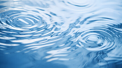 Close-up shot of water ripples forming abstract patterns with subtle reflections