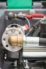 Fototapeta na wymiar Part of hydraulic or pneumatic mechanism in machine. Technology