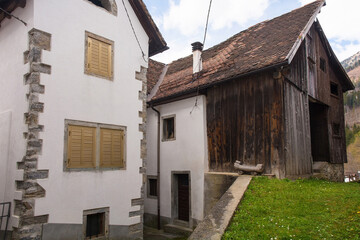 Historic residential and agricultural buildings in the mountain village of Mieli near Comeglians in Carnia, Friuli-Venezia Giulia, north east Italy