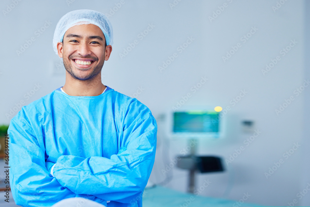 Wall mural Portrait, surgeon and Asian man with arms crossed in hospital, healthcare and wellness. Face, happy doctor and medical professional, expert nurse and confident surgery employee in scrubs in Cambodia