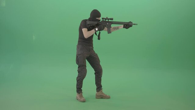 Army soldier shooting with gun on green screen 4K Video Clip