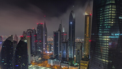 Financial center of Dubai city with luxury skyscrapers all night timelapse, Dubai, United Arab Emirates