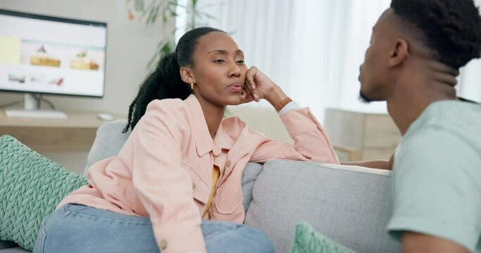 Upset, fight and couple on sofa with problem, conflict and argument in home for break up. Dating, love and African man and woman in living room ignore for cheating, infidelity and affair betrayal