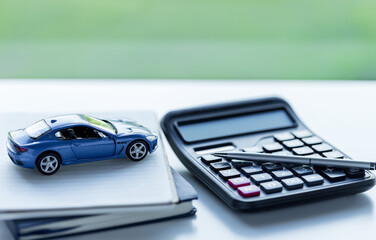 Car loan,money, banknote on agreement document or car insurance application form. Saving money for...