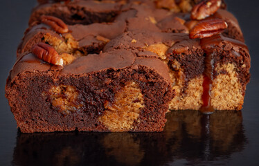 cake with chocolate and pecan nuts, front image