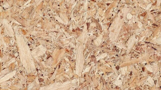 Chipboard plywood yellow close-up, rotating, turning, close-up, looped video
