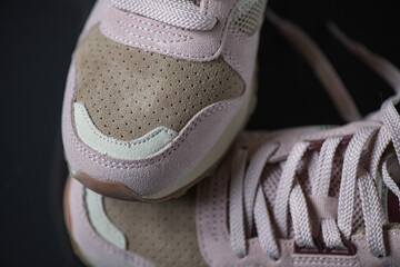 Fragment of original suede sports sneakers.