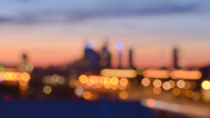 Evening blurred cityscape with bokeh effect - obrazy, fototapety, plakaty