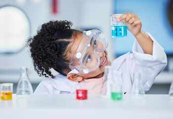 Science, learning and happy with child in laboratory for experiment, education and research....