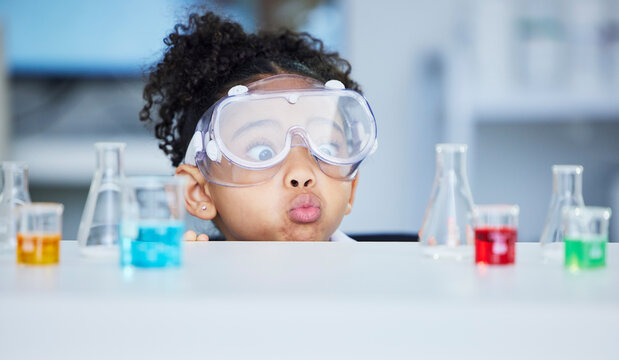 Naklejki Science, learning and surprise with child in laboratory for experiment, education and research. Future, funny and knowledge with face of young girl and chemicals for results, medicine and analysis