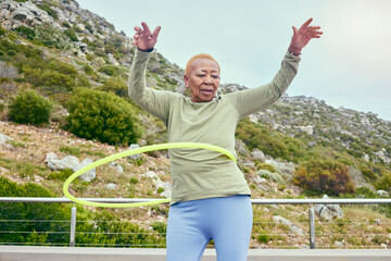 Senior fun, game and black woman with a hula hoop for sports, exercise or cardio in nature. Happy, elderly and an African person training with a toy for a workout, recreation or hobby on the weekend - obrazy, fototapety, plakaty