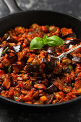Sicilian Eggplant, Aubergine caponata in iron cast pan