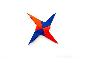 Origami paper star on a white background. diy. paper craft. 