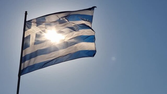greek flag greece waving in the wind and sun