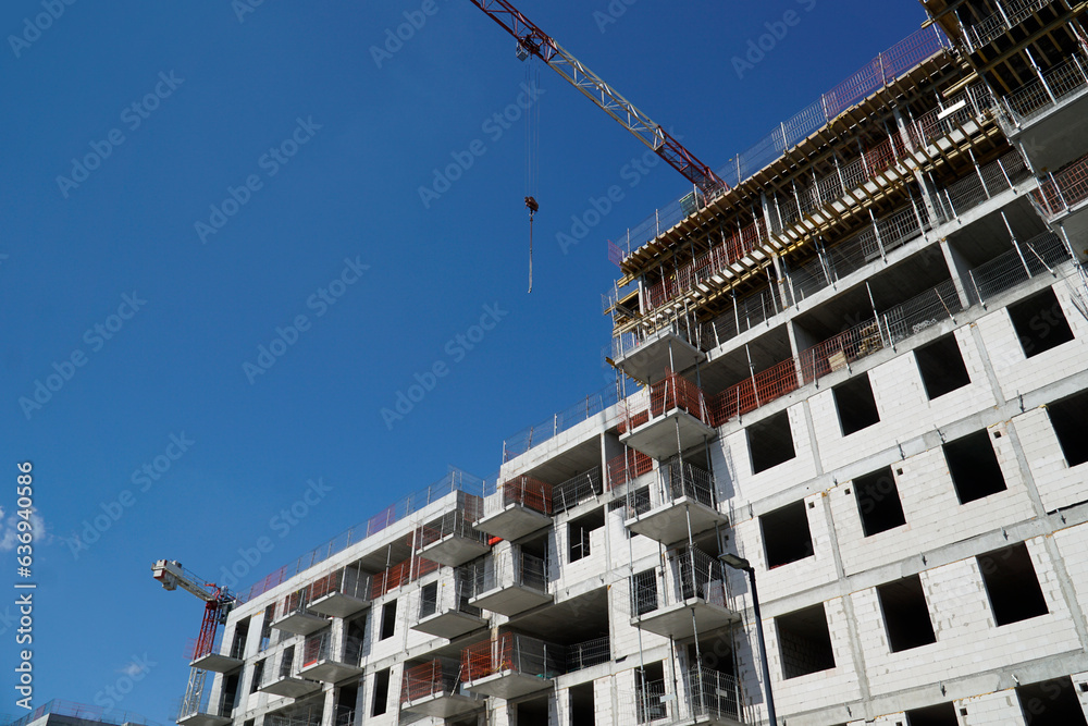 Wall mural multi storey residential building and construction crane