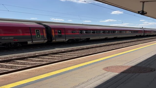 railjet train entering train station in Linz, Austria