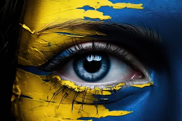 Tuinposter Macro of a crying eye in Ukrainian flag colors. © ORG