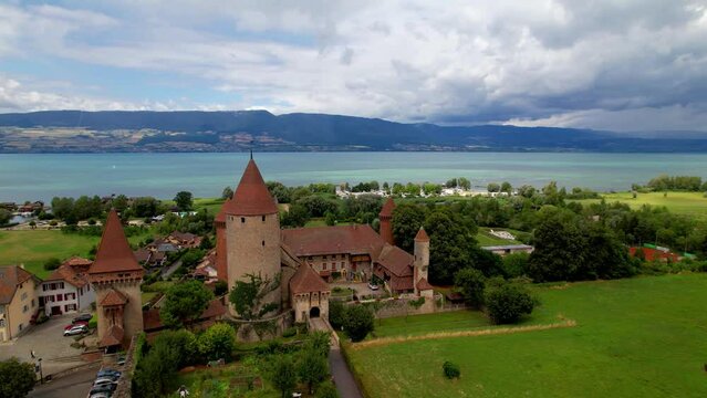 Switzerland scenic places. Estavayer-le-lac - charming traditional village, lake  Neuchatel. aerial drone video of medieval castle. Canton Fribourg