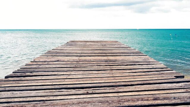 Wooden pier in the sea, Tailand.