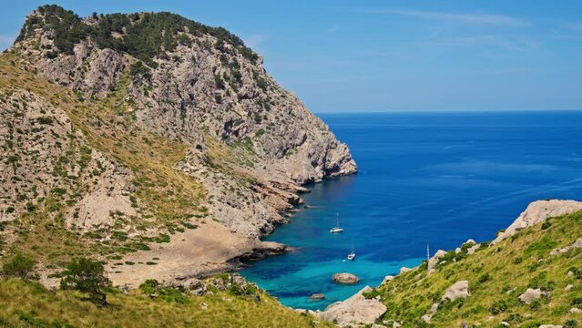 Beautiful rock towering over the blue sea
