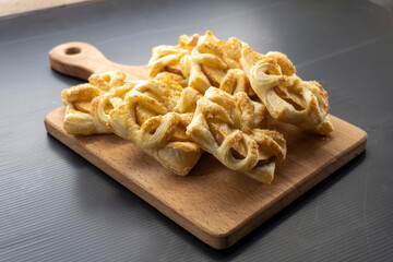 Puff pastry apple tarts  on black background.food concept. dessert. bakery