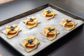Puff pastry apple tarts  on black background.food concept. dessert. bakery