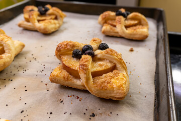 Puff pastry apple tarts  on black background.food concept. dessert. bakery