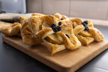 Puff pastry apple tarts  on black background.food concept. dessert. bakery