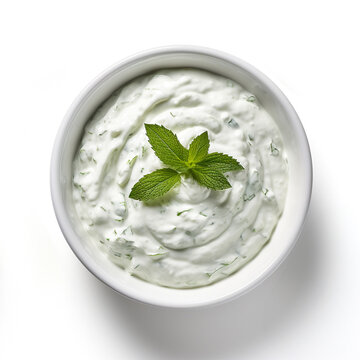Fresh tzatziki in a plate , isolate top view