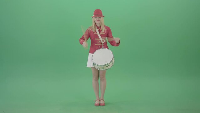  Girl fast playing drum music instrument isolated on Green Background - 4K Video Footage