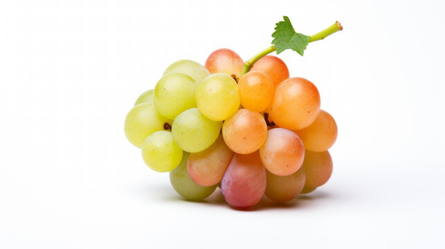 A bunch of grapes isolated on a white background. Green stem, leaf. Studio photography. Dew, mist, washed. Fresh produce. Diffuse lighting.