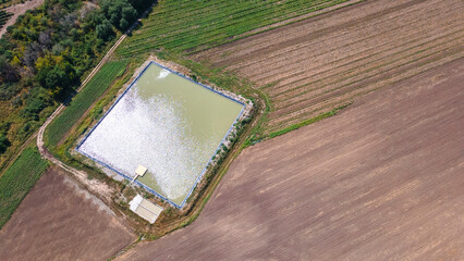 Artificial reservoir for irrigation of crops