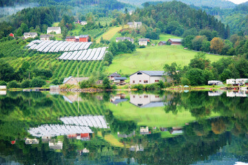 Fototapeta premium The Hardangerfjord (English: Hardanger Fjord) is the fifth longest fjord in the world, and the second longest fjord in Norway.