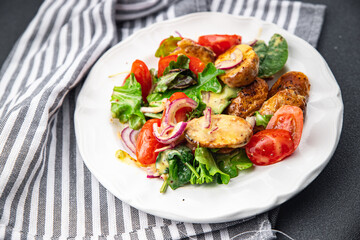 salad baked potato vegetable potato, tomato, onion, green salad leaves, salad dressing vinaigrette vegetables food healthy meal food snack on the table copy space food background rustic top view 