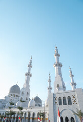 Fototapeta na wymiar Islamic Mosque with Blue Sky Background