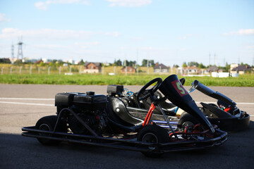 Kart car for racing on the track stands on the track before the start of the karting competition