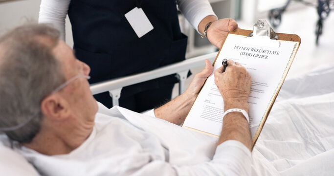 Hospital, doctor and man sign dnr form on clipboard for medical service, will and do not resuscitate. Healthcare, cancer and health worker with application for senior patient for insurance in clinic