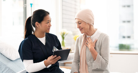Tablet, nurse and woman with cancer patient, elderly and hospital consultation for wellness. Tech,...